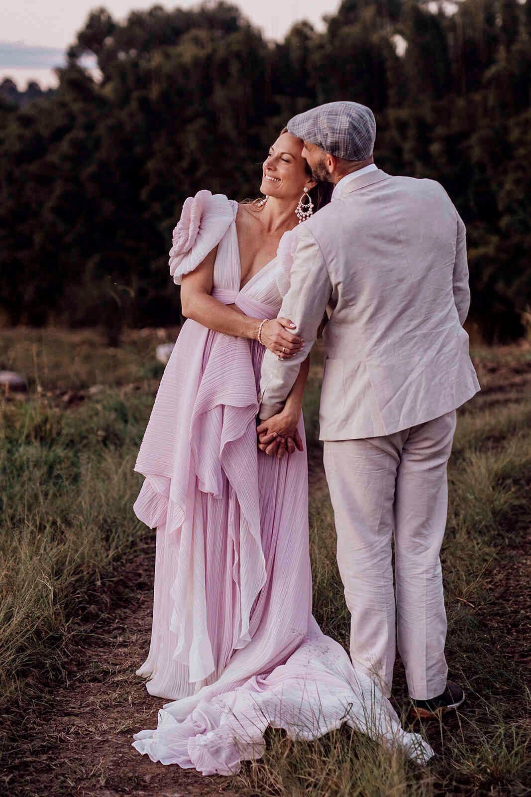bride_groom_romantic_sunset_portrait_pink_dress_tan_suit_bb26082819