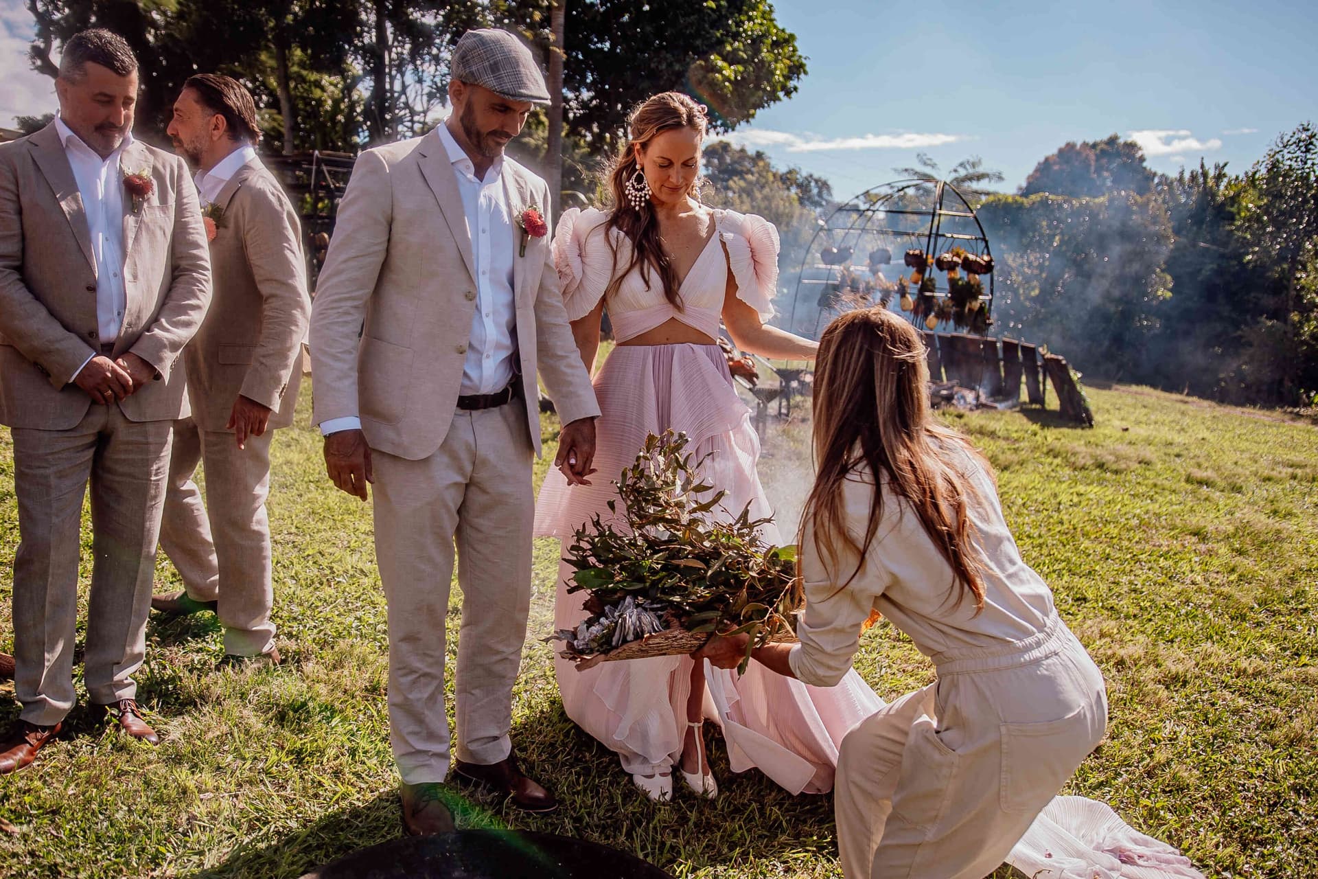 groom_bride_welcoming_ceremony_eucalyptus_leaves_firepit_db4a797877